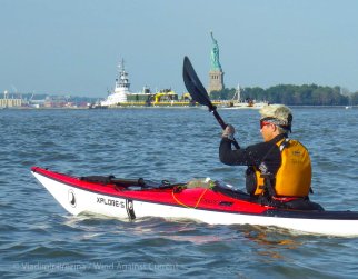 We paddle down the Hudson, with the Statue across the harbor