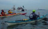 Kayakers gather off the Battery: When is this thing going to start?