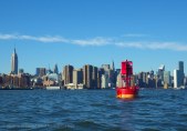 Past the well-known red buoy in the East River