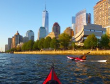 We paddle along the seawall of Battery Park City